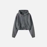 Front view of the dark grey Women's Fleece Zip-up Hoodie in a gray background 
