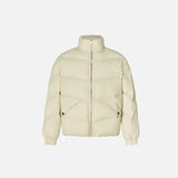 Front view of the apricot winter Oversized Puffer Jacket in a gray background 
