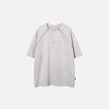 Front view of the gray black Loose Side Zipper T-Shirt in a gray background