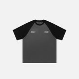 Front view of the gray Raglan Sleeve Contrast Color T-shirt in a gray background 