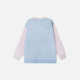 Back view of the blue Cosmic Eye Illumination Sweater in a gray background