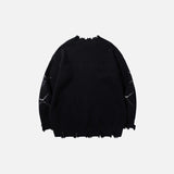 Back view of the black Dog's Defiance Sweater in a gray background