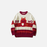 Front view of the red Fluffy Baby Dragon Knitted Sweater in a gray background