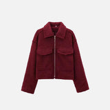 Front view of the red Quilted Utility Jacket in a gray background