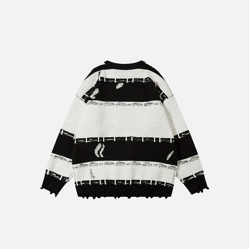 Back view of the black Oversized Ripped Loose Sweater in a gray background 