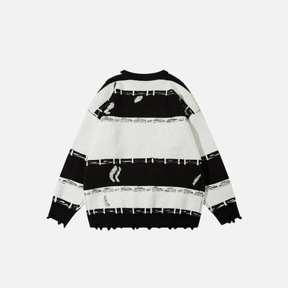 Back view of the black Oversized Ripped Loose Sweater in a gray background 