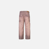 Back view of the pink Utility Workwear Jeans in a gray background