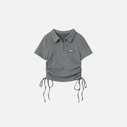 Front view of the grey Women's Polo With Side Ties T-shirt  in a gray background 