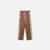 Front view of the auburn Side Striped High-waist Sweatpants in a gray background 