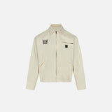 Front view of the apricot Loose Retro Washed Jacket in a gray background 