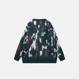 Back view of the green Vintage Loose Gradient Dyed Sweater in a gray background 