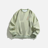 Front view of the green Abstract Motion Sweatshirt in a gray background