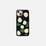 Front view of the green Dreamy Charm Case in a gray background
