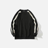 Front view of the black Y2K Edge Track Sweatshirt in a gray background