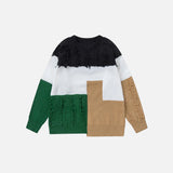 Front view of the black Mosaic Harmony Sweater in agray background