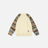 Front view of the black Textured Sleeve Knit Sweatshirt in a gray background