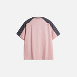 Back view of the pink Loose Sports Athletic T-shirt in a gray background