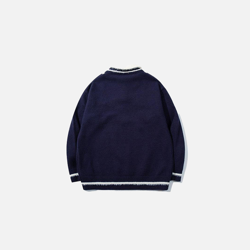Back view of the navy blue Vintage Drawstring Oversized Sweater in a gray background