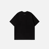 Back view of the black The Island Graphic T-shirt in a gray background 