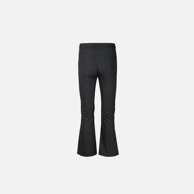 Back view of the black Classic Bell-Bottom Jeans in a gray background