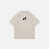 Front view of the beige Sleek Mono Logo T-shirt in a gray background