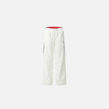 Front view of the white Classic Relaxed Fit Pants in a gray background