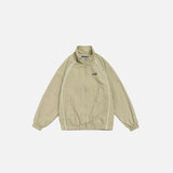 Front view of the khaki Vintage Striped Varsity Jacket in a gray background 
