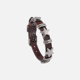 Front view of the brown Star-Studded Leather Bracelet in a gray background