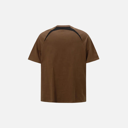 Back view of the brown Embroidery Patchwork T-shirt in a gray background