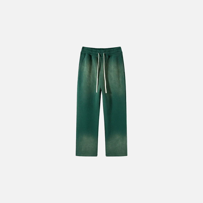 Front view of the dark green Casual Noir Relax Pants in a gray background