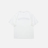 Back view of the white Oversized Loose Printed T-shirt in a gray background 