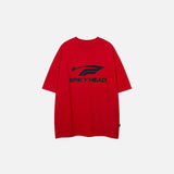 Front view of the red "Spiky Head" Letter Print T-shirt in a gray background 