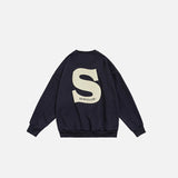Back view of the navy blue S Foaming Print Sweatshirt in a gray background