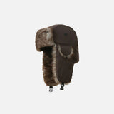 Front view of the coffee Faux Fur Lined Trapper Hat in a gray background
