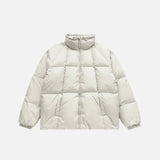 Front view of the white High-Neck Puffer Jacket in a gray background