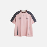 Front view of the pink Loose Sports Athletic T-shirt in a gray background