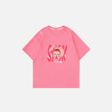 Front view of the pink Artistic Face Print Oversized T-shirt in a gray background
