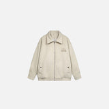 Front view of the apricot Classic Zip-Up Jacket in a gray background