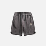 Front view of the grey Vintage Cozy Sports Shorts in a gray background