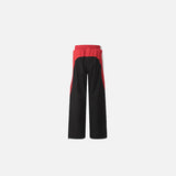 Back view of the black Classic Relaxed Fit Pants in a gray background