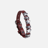 Front view of the red Star-Studded Leather Bracelet in a gray background