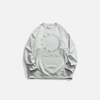 Front view of the green Loose  Embroidered Sweatshirt in a gray background