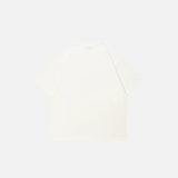Back view of the beige Ethereal Gaze Artistic Eye T-shirt in a gray background