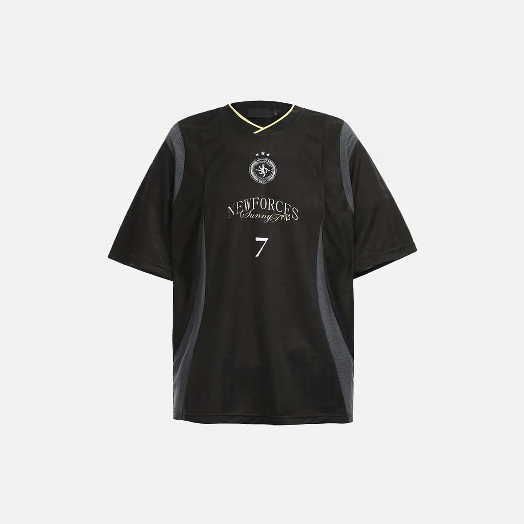 Front view of the black Vintage Patchwork Sports Graphic T-Shirt in a gray background