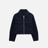 Front view of the navy blue Quilted Utility Jacket in a gray background