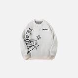 Front view of the beige Starlit Dreams Sweater in a gray background