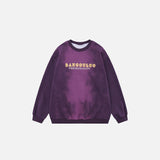 Front view of the purple Mystic Midnight Sweatshirt in a gray background