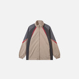 Front view of the khaki Y2K Retro Zip-Up Windbreaker Jacket in a gray background
