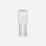 Front view of the white Distressed Patchwork Skinny Jeans in a gray background