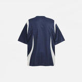 Back view of the blue Vintage Patchwork Sports Graphic T-Shirt in a gray background